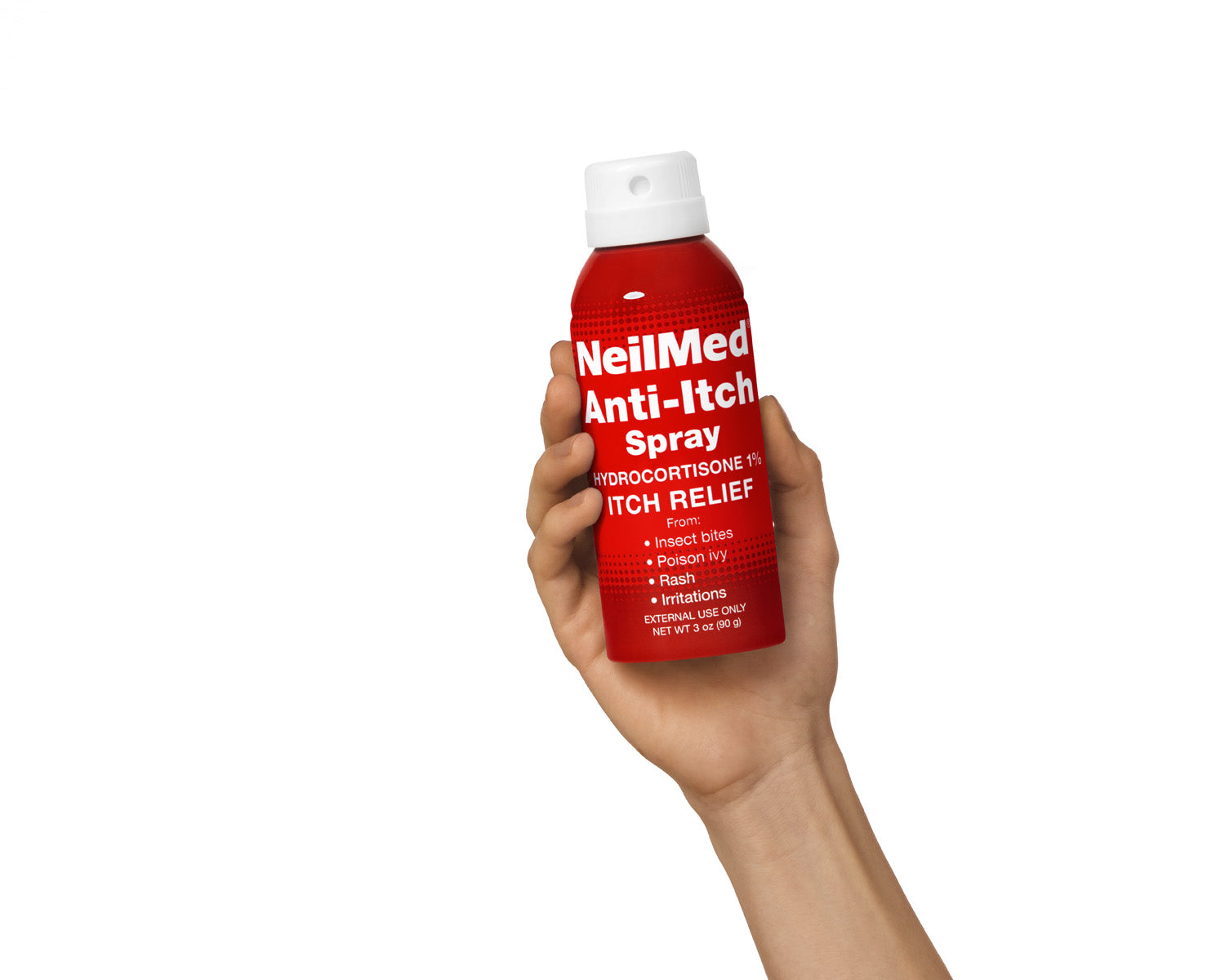 Hand holding a red bottle of NeilMed Anti-Itch Spray on a white background