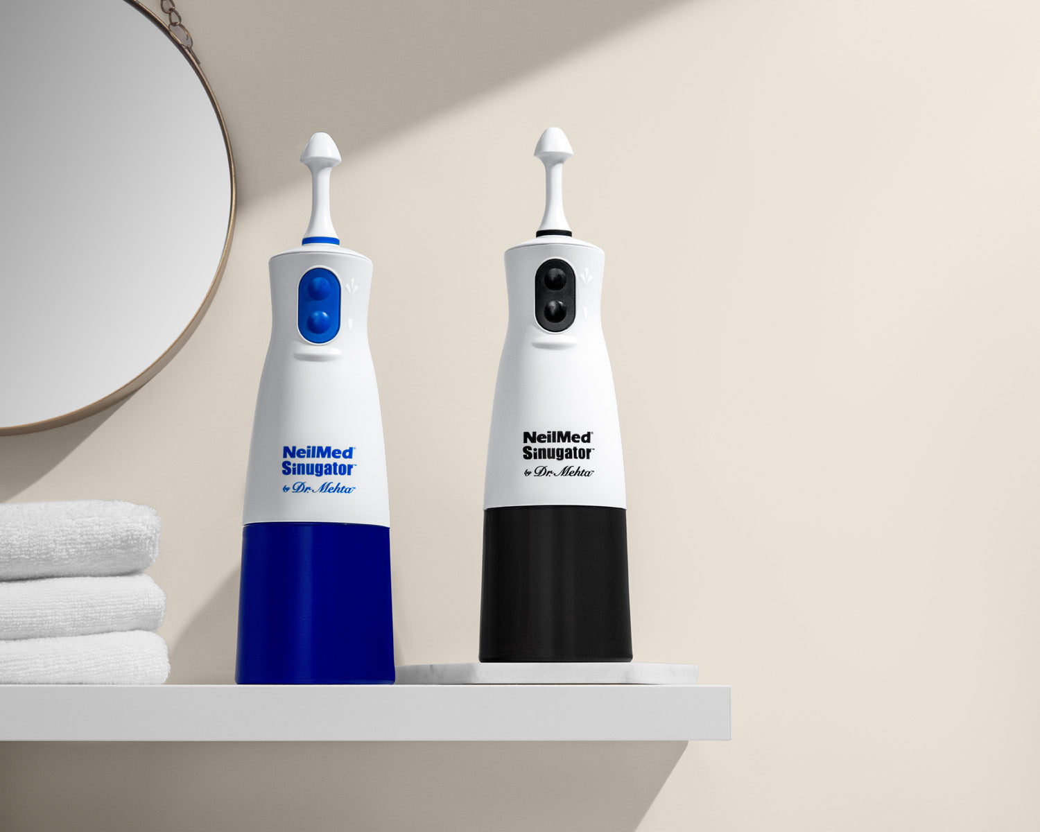 Blue Sinugator next to Black Sinugator on a shelf.